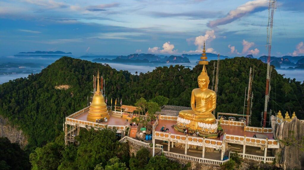 The Tiger Cave Temple in southern Thailand serves as a religious site for the monks who live and worship there, and features a maze of natural caves in an overgrown jungle valley. This Buddhist complex is also popular with believers and travelers.