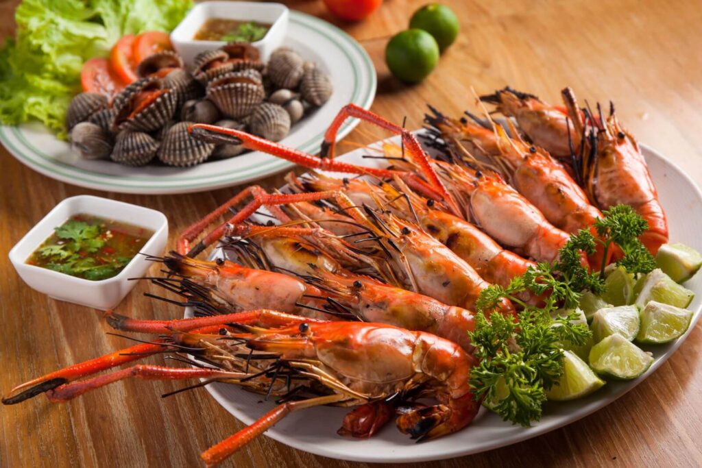 The Andaman Islands are famous for their fresh seafood. Grilled fish, prawns, and squid are commonly served with spicy dipping sauces