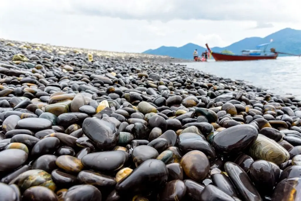 long-tail-boat-bring-tourists-travel-ko-hin-ngam-island-beautiful-rock-with-strange-black-color-is-famous-attractions-tarutao-national-park-andaman-sea-satun-thailand