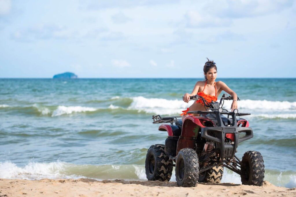 woman-riding-beach-atv-phuket-thailand