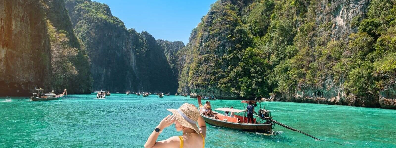 woman-tourist-boat-trip-traveller-relaxing-pileh-lagoon-phi-phi-island-krabi-thailand-destination-travel-vacation-holiday