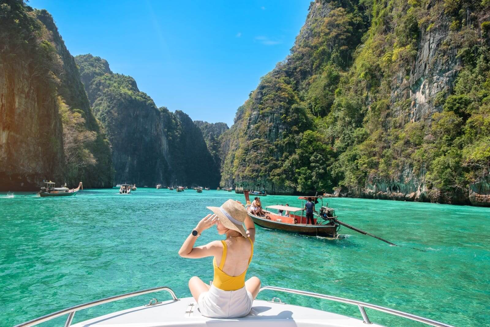 woman-tourist-boat-trip-traveller-relaxing-pileh-lagoon-phi-phi-island-krabi-thailand-destination-travel-vacation-holiday