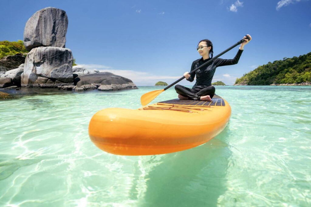 asian-woman-relax-beach-with-sup-board-lipe-island-phuket-krabi-phang-nga-andaman-sea-islands-thailand