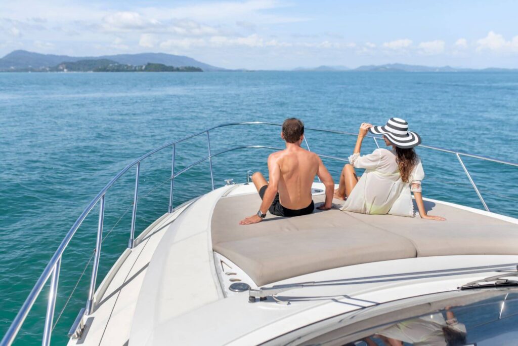 rear-view-man-woman-sunbathe-luxury-white-yacht