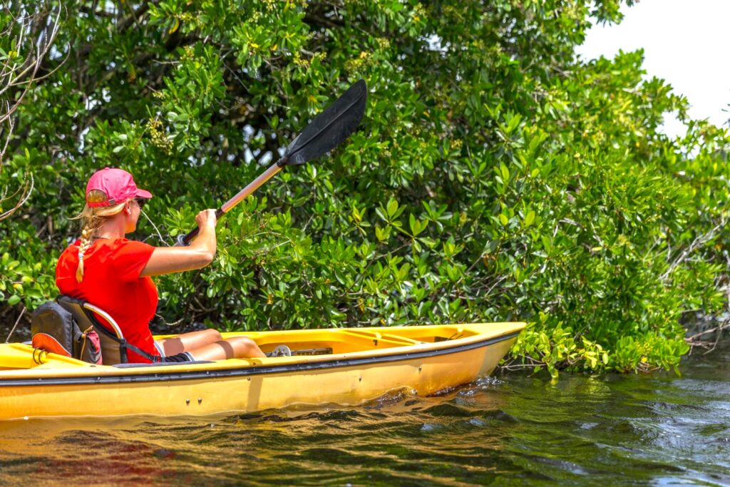 young-woman-kayaking-phang-nga-bay-national-park