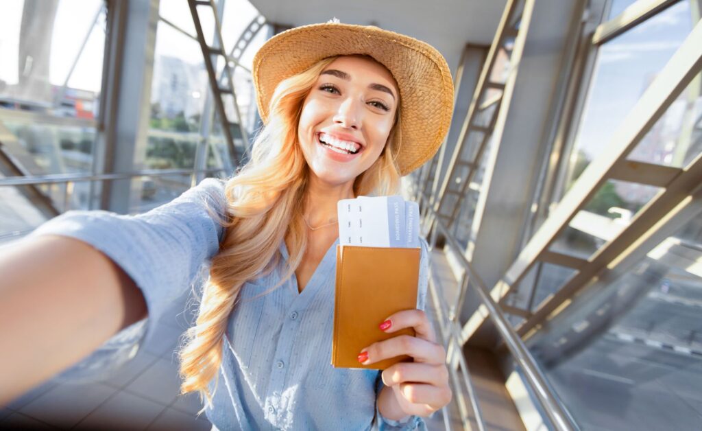 beautiful-woman-solo-traveler-selfie-airport-thailand