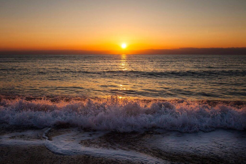 evening-sunset-beach-with-sea-surf-krabi-thailand-andaman-sea-and-island