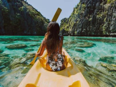 woman-kayaking-in-phang-nga-bay-andaman-sea-islands-phuket-tours