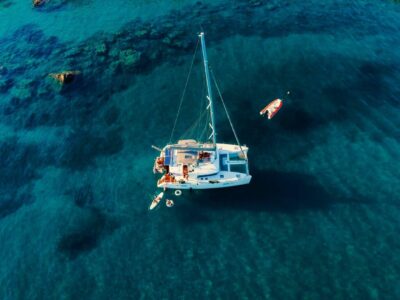 amazing-top-view-catamaran-anchored-blue-sea-summer-travel-background-cruise-vacation catamaran-anchored-blue-sea-summer-travel-background-cruise-vacation